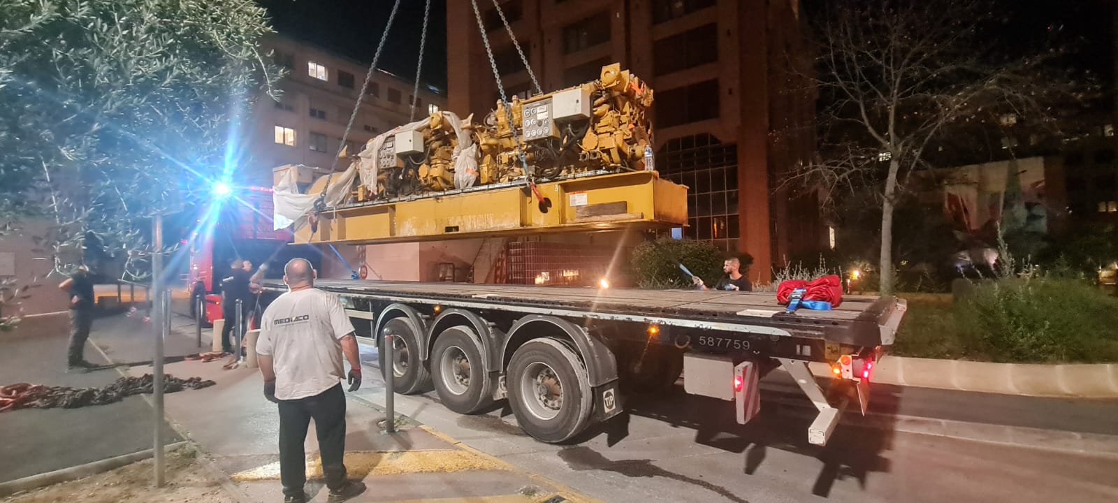 Chargement de l'ancienne cogénération sur camion